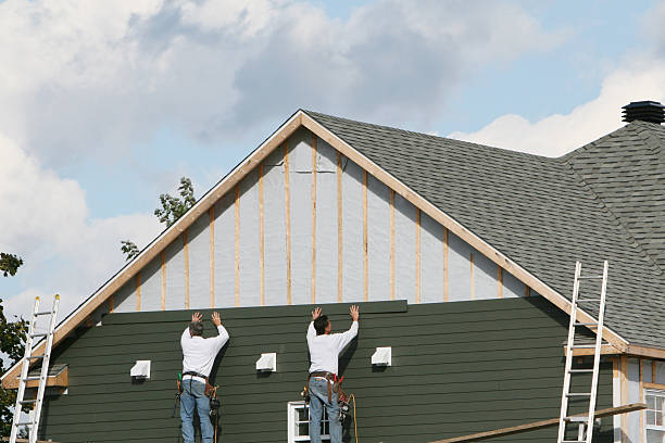 Professional Siding technician working in Trinity, TX